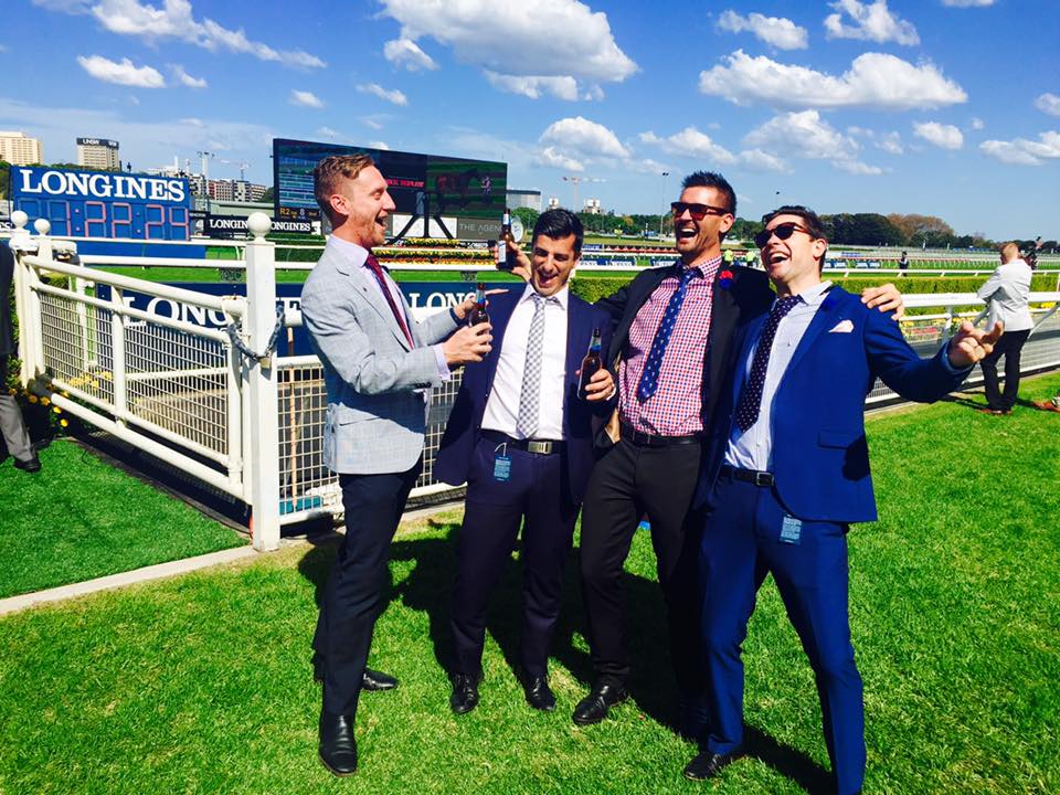 group of men at horse racing 